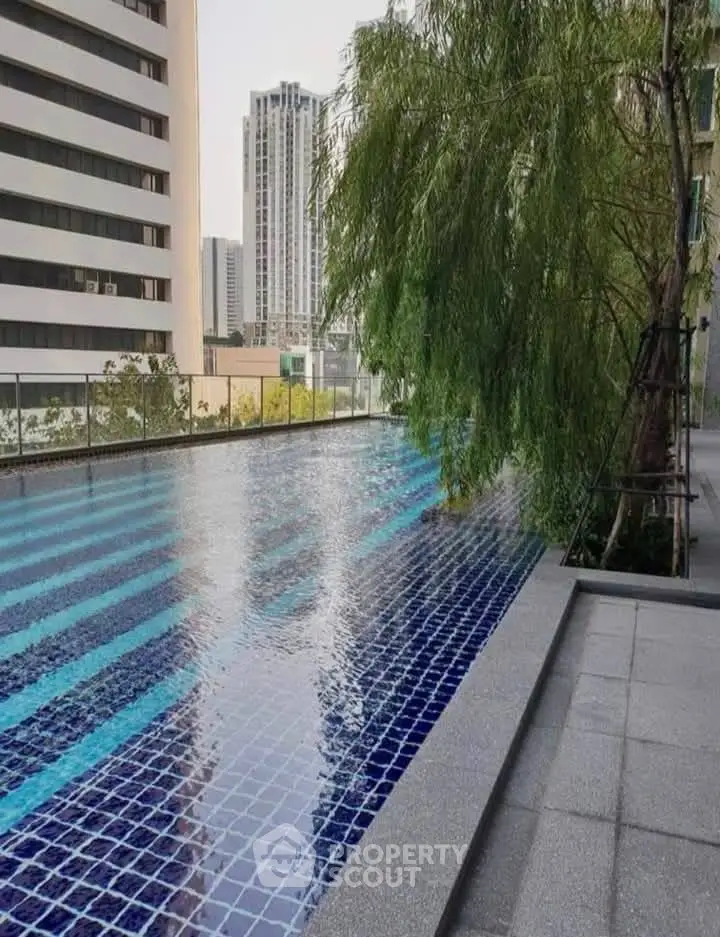 Luxurious rooftop pool with stunning city views and modern design.