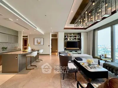 Luxurious open-plan living room with modern kitchen and stunning city view