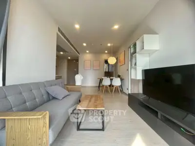 Modern living room with sleek furniture and open layout, perfect for contemporary living.