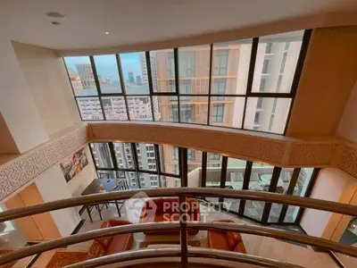 Luxurious duplex with stunning city views and elegant interior design
