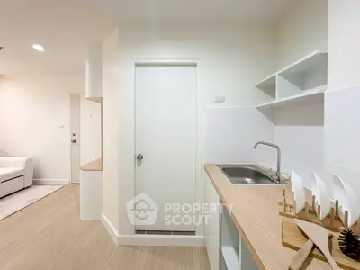 Modern kitchen with sleek design and open shelving