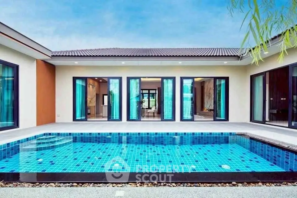 Luxurious modern villa with private pool and elegant architecture, perfect for serene living.