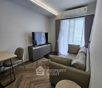 Modern living room with stylish furniture and natural light