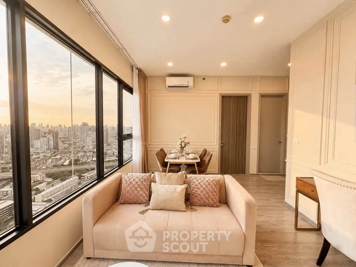 Luxurious high-rise living room with stunning city views and elegant decor.