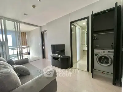 Modern living room with sleek design and built-in washing machine