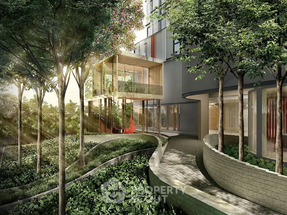 Luxurious modern building entrance with lush greenery and elegant design