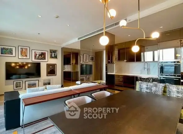 Modern living room with open kitchen and stylish decor