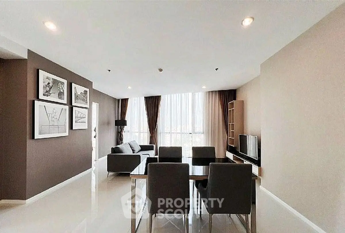 Spacious modern living room with elegant dining area and large windows.