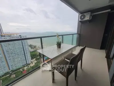 Stunning balcony with ocean view in high-rise apartment