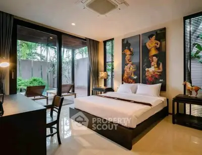 Luxurious bedroom with garden view and elegant decor in modern home