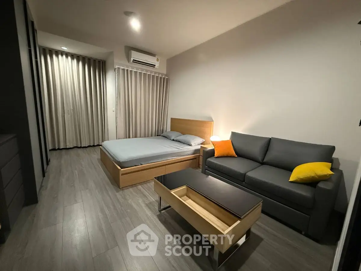 Modern bedroom with sleek furniture and cozy ambiance