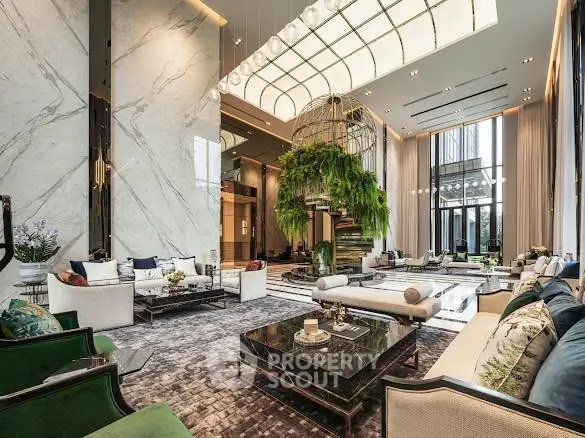 Luxurious and spacious living room with high ceilings, elegant decor, and abundant natural light.