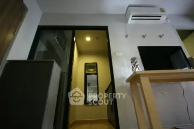 Modern interior with air conditioning and sleek furniture in a cozy living space.