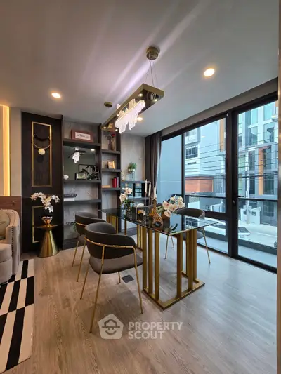 Modern living room with elegant dining area and large windows offering city views.