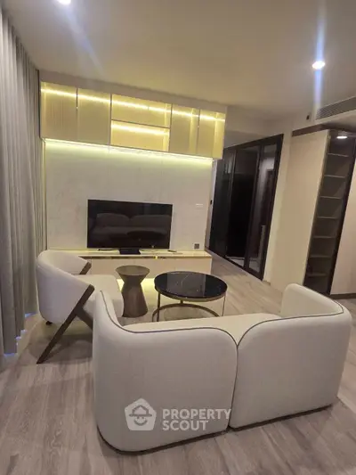 Modern living room with elegant furniture and ambient lighting