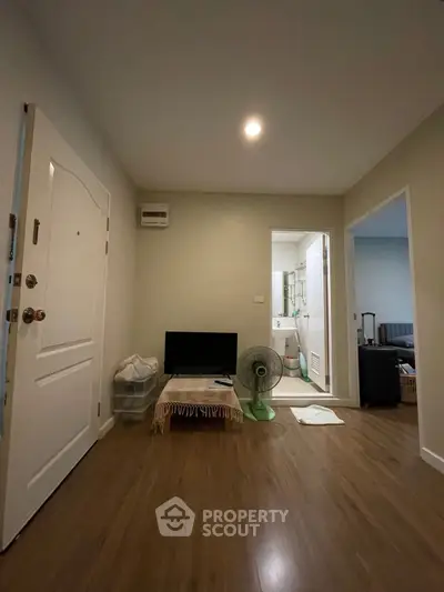 Cozy apartment interior with wooden flooring and modern decor