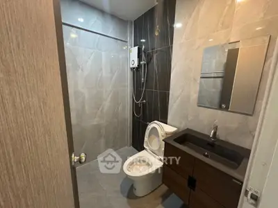 Modern bathroom with sleek fixtures and elegant tile design