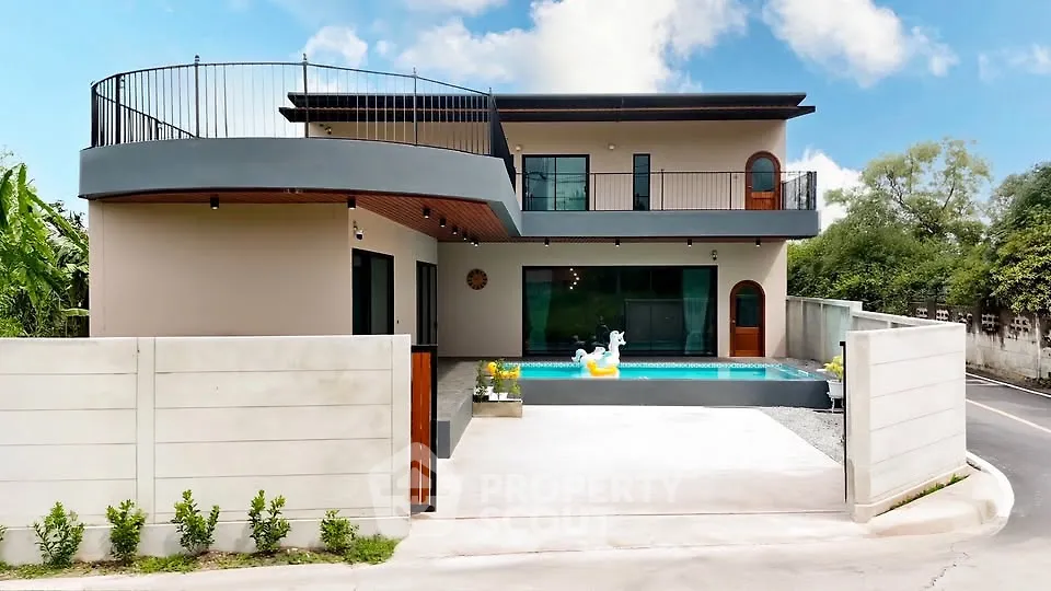 Modern two-story house with pool and spacious driveway