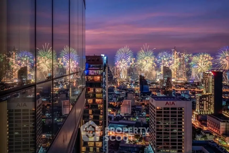 Stunning cityscape view with vibrant fireworks illuminating the skyline, reflecting off modern glass buildings.