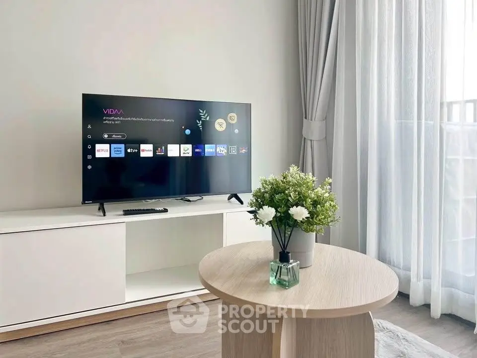 Modern living room with sleek TV setup and elegant decor