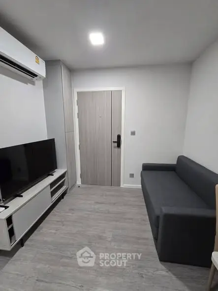 Modern living room with sleek furniture and minimalist design