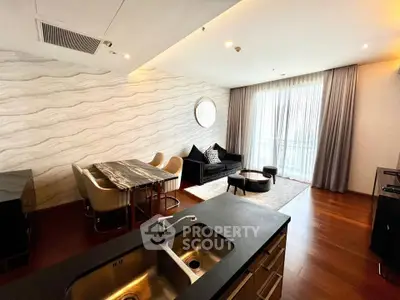 Luxurious modern living room with elegant dining area and large windows.