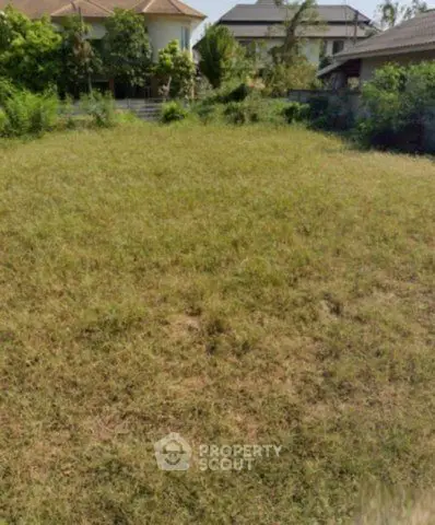 Spacious vacant land plot in a serene residential neighborhood, ideal for building a dream home.
