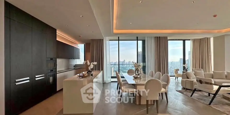 Luxurious open-plan living and dining area with stunning city views and modern kitchen.