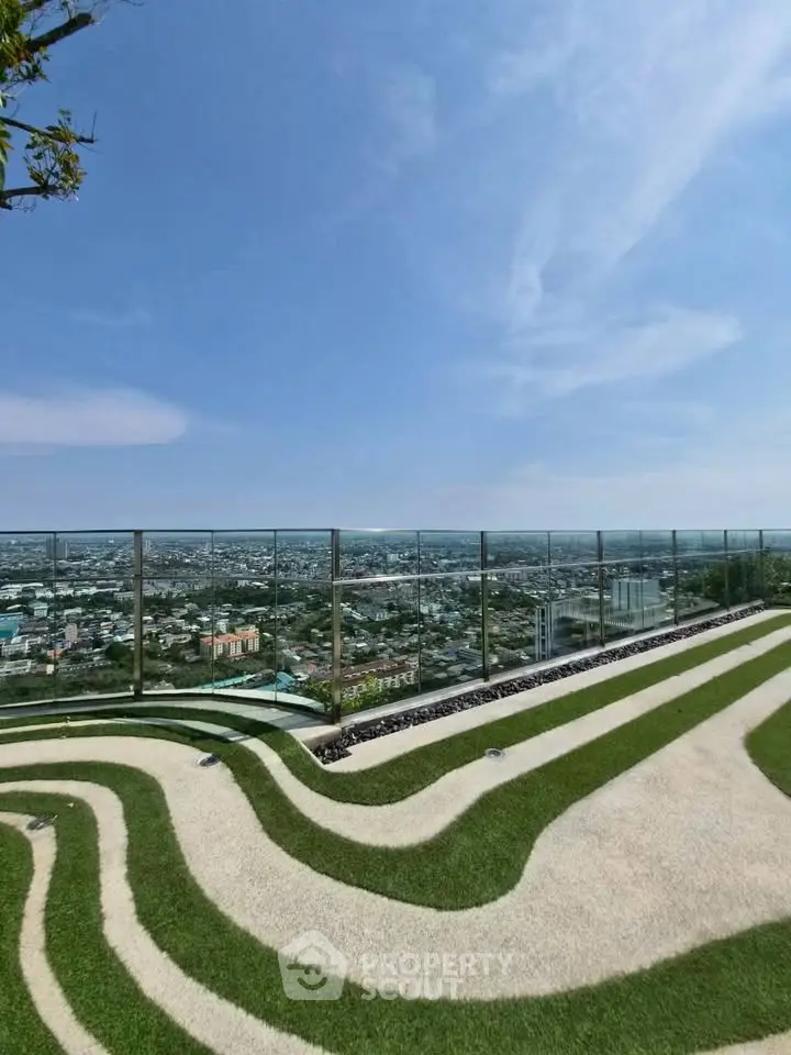 Stunning rooftop garden with panoramic city views and modern design.