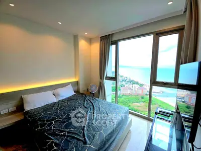 Luxurious bedroom with stunning ocean view from high-rise apartment