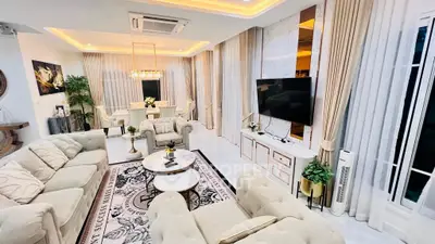 Luxurious living room with elegant decor, plush seating, and ambient lighting, perfect for sophisticated gatherings.