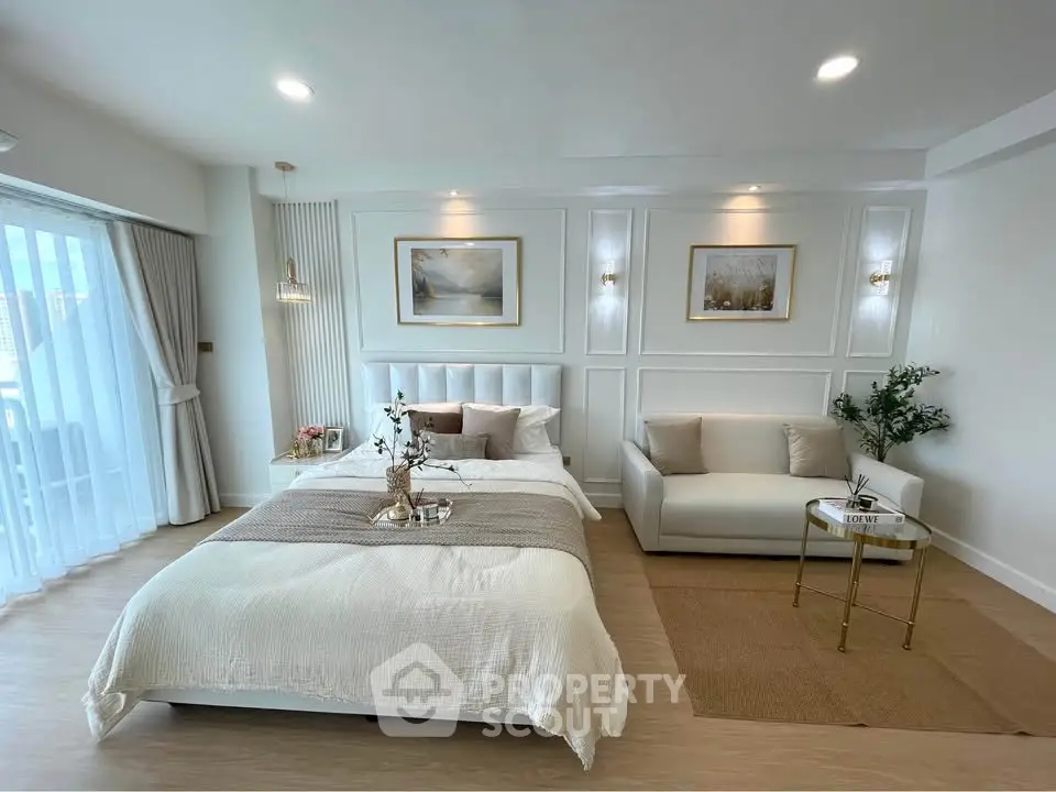 Luxurious bedroom with elegant decor and natural light in modern apartment
