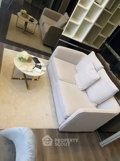 Stylish modern living room with cozy sofa and elegant decor