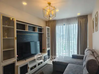 Modern living room with elegant decor and large window view