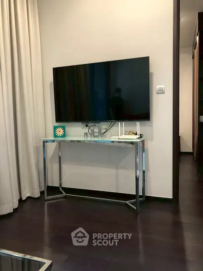 Modern living room with sleek TV setup and elegant decor