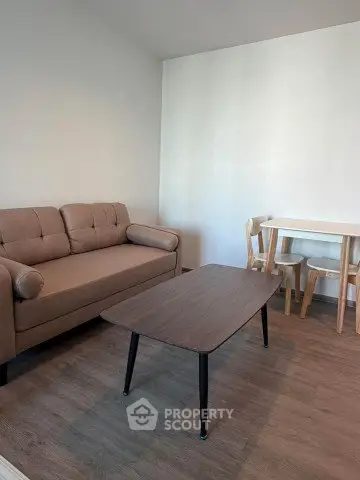 Cozy living room with modern furniture and wooden flooring
