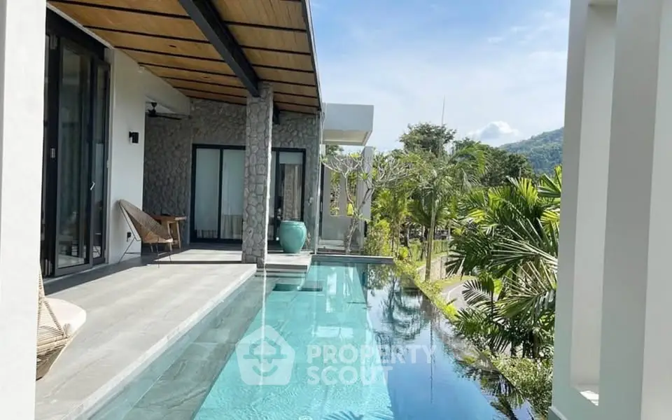 Luxurious modern villa with infinity pool and stunning mountain views, perfect for serene living.