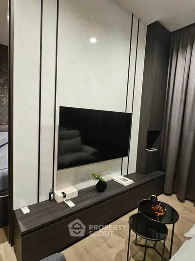 Modern living room with sleek TV setup and stylish decor