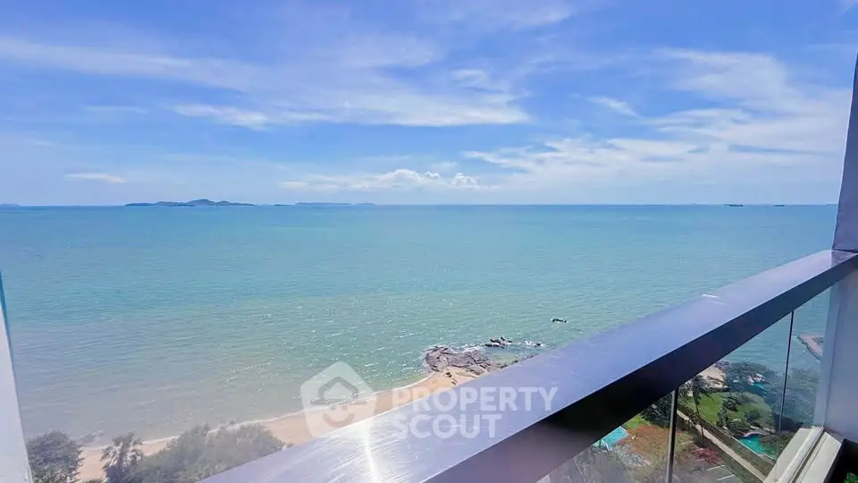 Stunning ocean view from a high-rise balcony, perfect for seaside living.