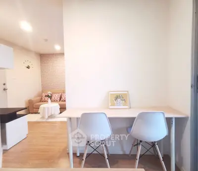 Modern living room with stylish furniture and cozy decor, perfect for urban living.