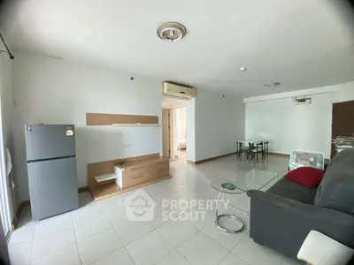 Spacious living room with modern furniture and open layout