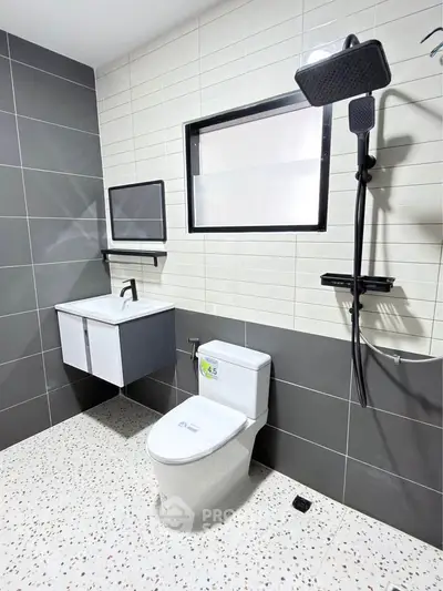 Modern bathroom with sleek fixtures and stylish tile design