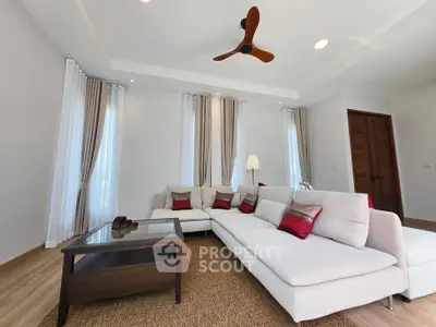 Spacious modern living room with elegant decor and natural light