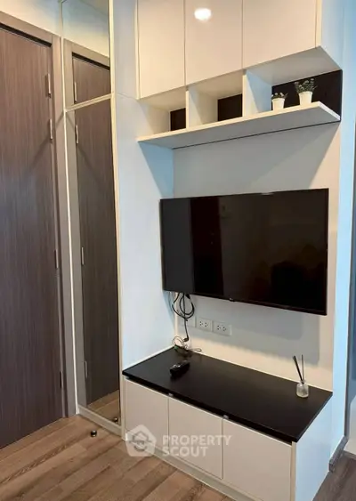 Modern living room with sleek TV unit and stylish storage solutions