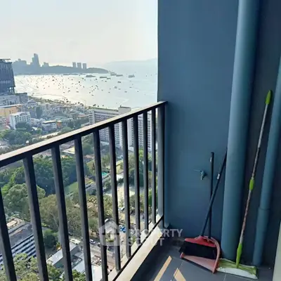 Stunning high-rise balcony with breathtaking ocean view and cityscape