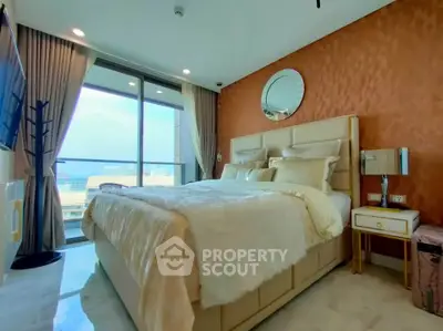 Luxurious bedroom with modern decor and stunning balcony view