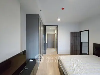 Modern bedroom with minimalist design and sleek furniture