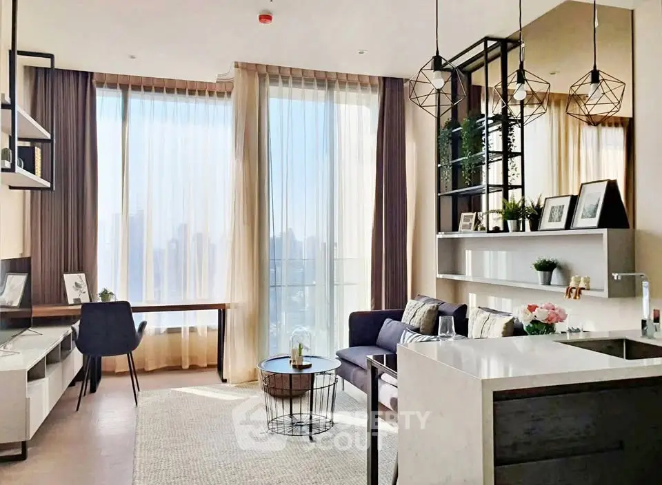 Modern living room with floor-to-ceiling windows and stylish decor in a high-rise apartment.
