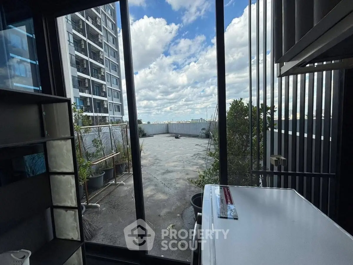 Stunning rooftop view with expansive cityscape and modern building design.