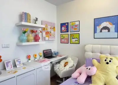 Charming bedroom with cozy decor and colorful wall art, perfect for a playful and inviting atmosphere.